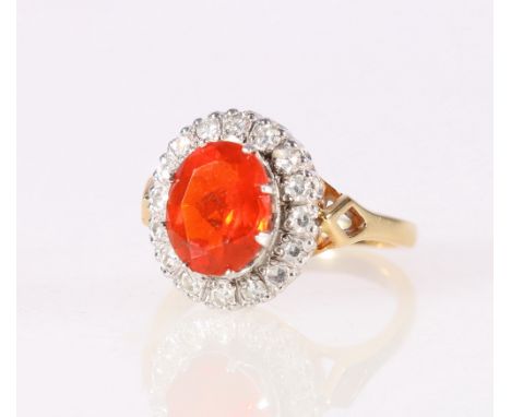 18ct yellow and white gold fire opal and diamond set cluster ring, size O, 6.3g.CONDITION REPORT:0.7 w x 0.9 long x approx 0.