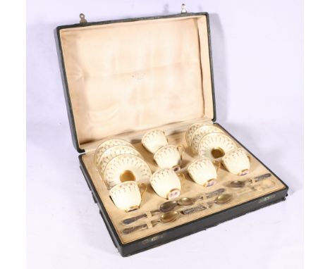 Royal Worcester six place porcelain coffee set with cream ground and gilt decoration, also five silver gilt coffee spoons in 