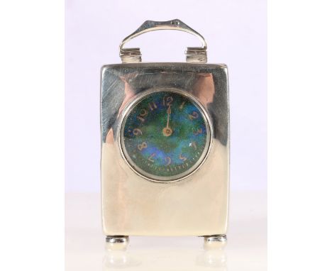 Archibald Knox for Liberty & Co. Arts & Crafts silver cased carriage clock, with enamelled dial having Arabic numerals, raise