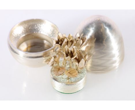Elizabeth II silver 'surprise' egg containing floral posy in the manner of Stuart Devlin, with makers marks NP for Nicholas P