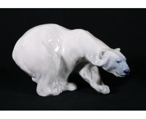 Royal Copenhagen polar bear model, blue stamp to base, incised 1137 W to base, 27cm long.CONDITION REPORT:No obvious damage, 