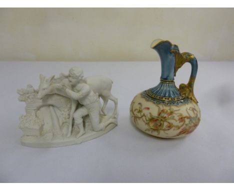 A Royal Worcester blush Ivory ewer hand-painted with tube line gilt decoration and a bisque figure of a boy and deer