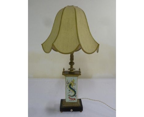An Oriental porcelain lamp base, rectangular decorated with dragons on raised base with shade