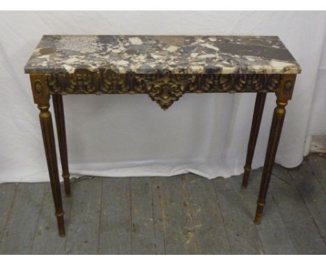 A console table, rectangular, carved with leaves and scrolls with marble top on fluted tapering cylindrical legs