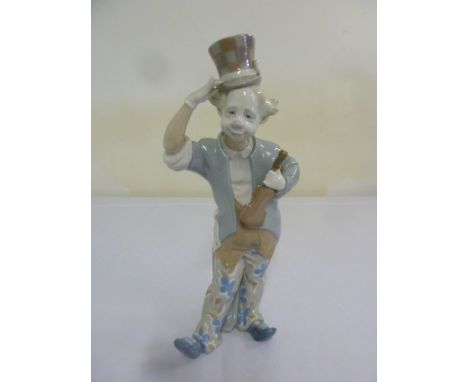 Lladro figurine of a clown raising his hat