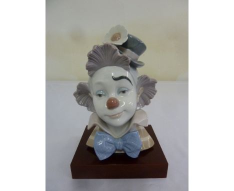 Lladro bust of a young clown on square base 5610