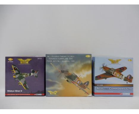 Three Corgi Aviation Archive 1/72 scale models to include a Hawker Typhoon 1B, Squadron Leader R.P. Beaumont, a Hawker Hurric