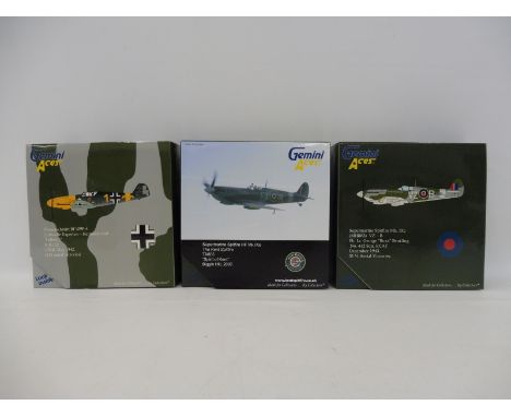 Three Gemini Aces 1/72 scale models: a Supermarine Spitfire, Biggin Hill 2007; a Messerschmitt 109F, USSR May 1942 and one ot