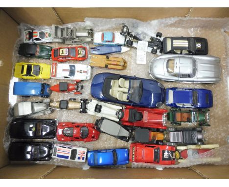 A quantity of die-cast and plastic vehicles including a Franklin Mint Mercedes 300 SL.