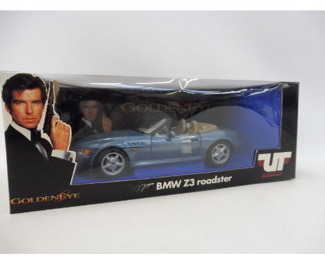 A UT Models James Bond BMW Z3 1:18 scale model. A rare example of the car that was featured in GoldenEye. Boxed and in excell