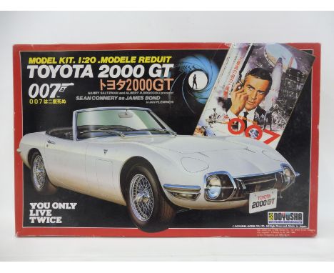 A Doyusha James Bond 007 Toyota 2000GT Model Kit - a highly detailed and increasingly rare example of this 1:20 scale model w