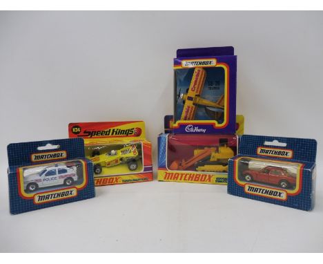 Five early 1970s Matchbox vehicles including Super Kings K-8 Caterpillar Traxcavator, Speed Kings K-34 Thunderclap with rare 