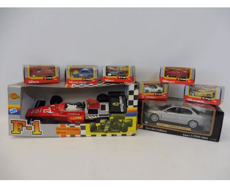 A boxed Rico F1 car plus a Maisto Special Edition Jaguar X-Type (2001) and six Burago 1/43 scale models.