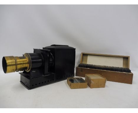 A magic lantern plus a collection of glass slides.