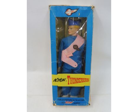 A very rare survival Thunderbird figure of John Tracy from Thunderbird 5, complete with badge and sash, and inner package sho