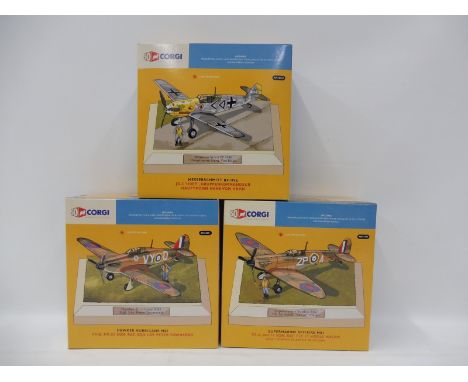 Three Corgi 50th Anniversary 1/72 scale models: a Hawker Hurricane Mk.I, Squadron Leader Pete Townsend; a Supermarine Spitfir