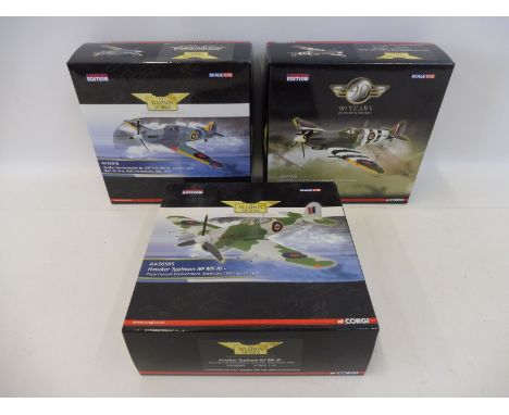 Three boxed Corgi Aviation Archive 1/72 scale models to include a Hawker Typhoon and a Supermarine Spitfire RAF Biggin Hill B