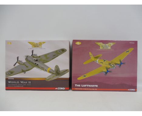 A Corgi Aviation Archive 1/72 scale Luftwaffer Heinkel HE-11H-6 and a Heinkel HE111H-4, Eastern Front 1942, appears in excell