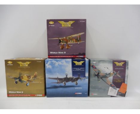 Four Corgi Aviation Archive 1/72 scale models: a Hawker Typhoo IDKU Egypt, a Westland Lysander Mk.II 255 Squadron, France 194