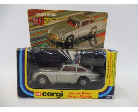 A 1977 Corgi 271 James Bond Aston Martin DB5 model in excellent condition, fully functional and with the original James Bond,