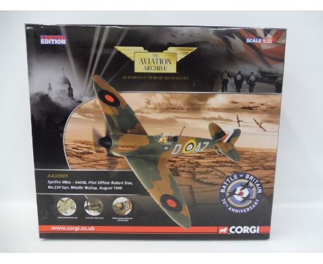 A boxed Corgi Aviation Archive 1/32 scale limited edition Battle of Britain 70th Anniversary Spitfire MKLA Pilot Officer Robe