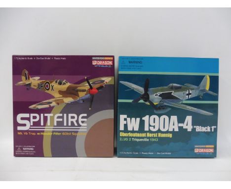 Two Dragons Warbird Series 1/72 scale models: a  FW109A Black 1 Horst Hannig 1943 and a Spitfire 601 Squadron, appear in exce