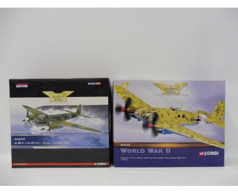 Two Corgi Aviation Archive 1/72 scale models: a JU88 A/1 France 1940 and a HE111 H6, Sardinia, 1943, appear in excellent cond