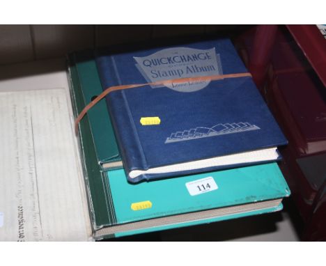 A vintage stamp album and two stock books