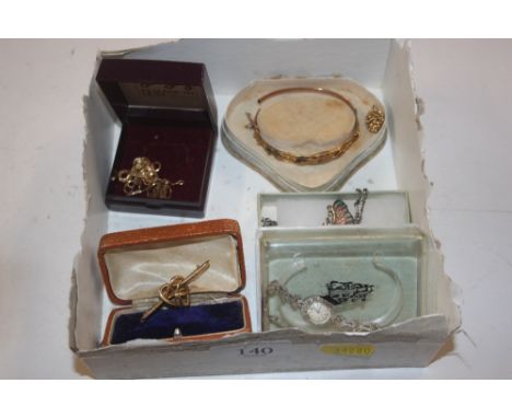 A silver bladed fruit knife; a yellow metal bar brooch; a yellow metal bangle set with rubies and diamonds AF; a 9ct gold nec