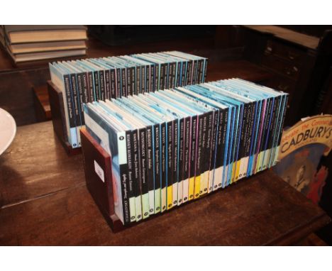 Two wooden CD racks and contents 