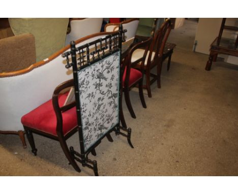 A mock bamboo firescreen with floral and bird printed panel 