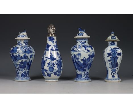 China, een paar en twee blauw-wit porseleinen dekselvaasjes, Kangxi periode (1662-1722), het paar gemodelleerd met vakken met