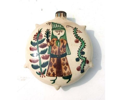 A Turkish Kutahya style pottery water flask decorated with figures and flowers, 17cms high.
