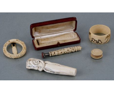 A 19th century Japanese ivory cane handle in the form of an octopus, 10.5cms high; together with a Chinese Canton ivory desk 