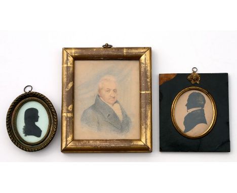 A Regency silhouette on glass depicting a child; together with a portrait silhouette depicting Thomas Hinkley, dated 1820; an