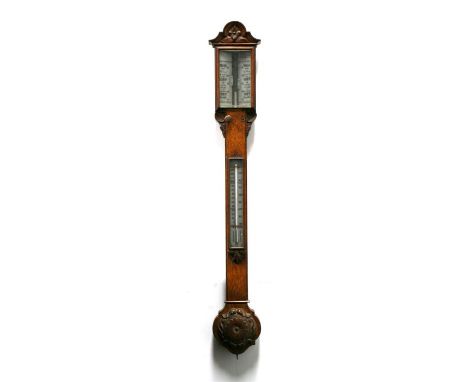 A 19th century oak stick barometer thermometer, 101cms high.