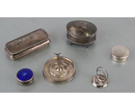 A silver ring treen, three silver boxes, a silver menu stand and a silver trinket box (6)Condition ReportThere are surface in