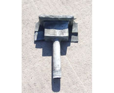 A lead rain hopper with downpipe, 77cms high.