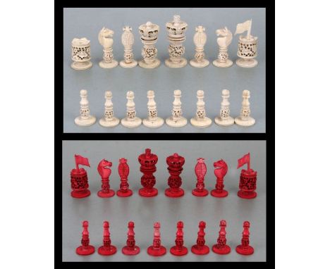 A 19th century Chinese Burmese pattern carved ivory chess set in stained and natural ivory, king height 10cms.Condition Repor