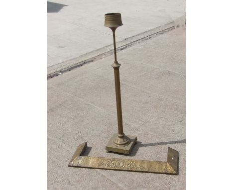 A late Victorian / Edwardian brass oil standard lamp base with hexagon shaped column, 148cms high; together with a brass fire