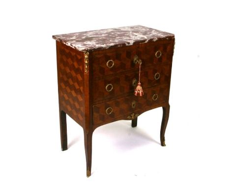 A late 19th century French parquetry inlaid commode of small proportion, the marble top above three graduated long drawers, o