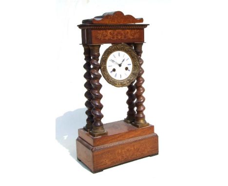 A mid 19th century French inlaid rosewood Portico mantle clock, the white enamel dial with Roman numerals, 52cms high.Conditi