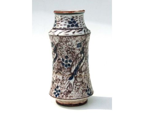 A Spanish / Islamic albarello decorated with stylised birds, 23cms high.