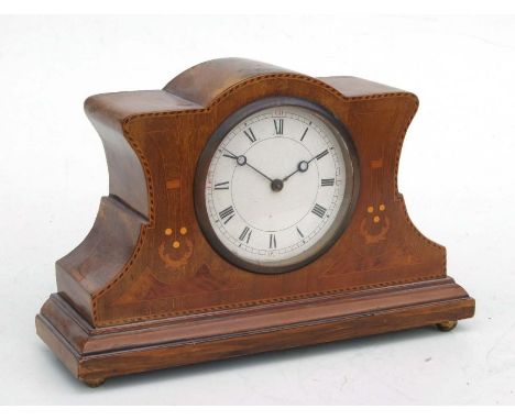 An Edwardian inlaid mahogany mantle clock, the white dial with Roman numerals, 24cms wide.