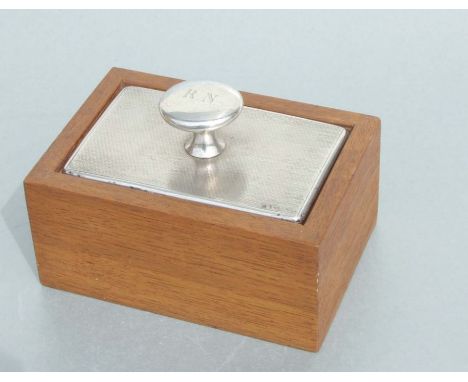 A George V silver lidded oak trinket box, the rectangular silver top with engine turned decoration and initialled 'RN', Birmi