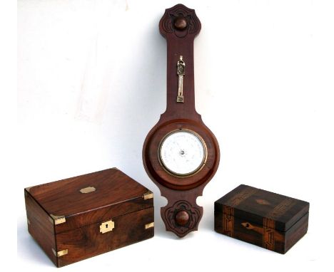 A 19th century brass bound mahogany box, 30cms wide; together with a marquetry inlaid banded box, 23cms wide; and a carved ma