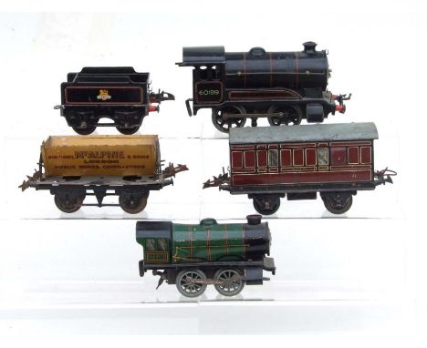 A quantity of Hornby 'O' gauge tin plate trains, carriages and track.