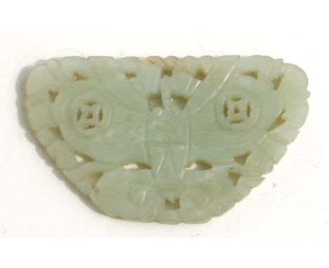 A Chinese pierced jade / hardstone pendant in the form of a butterfly. 7cm wide