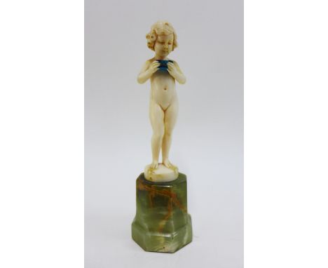 Ferdinand Preiss (1882-1943) Art Deco ivory figure of a girl holding a blue trinket box, signed and standing on an octagonal 