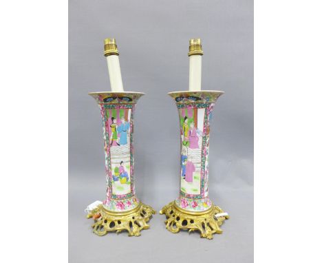 A pair of Chinese famille rose and gilt mounted table lamp bases, 29cm excluding fitting (2) 